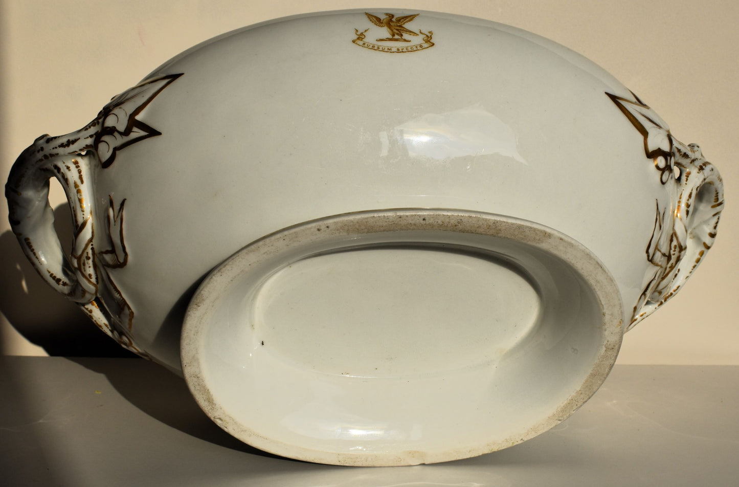 The base of the tureen is plain white with no makers marks