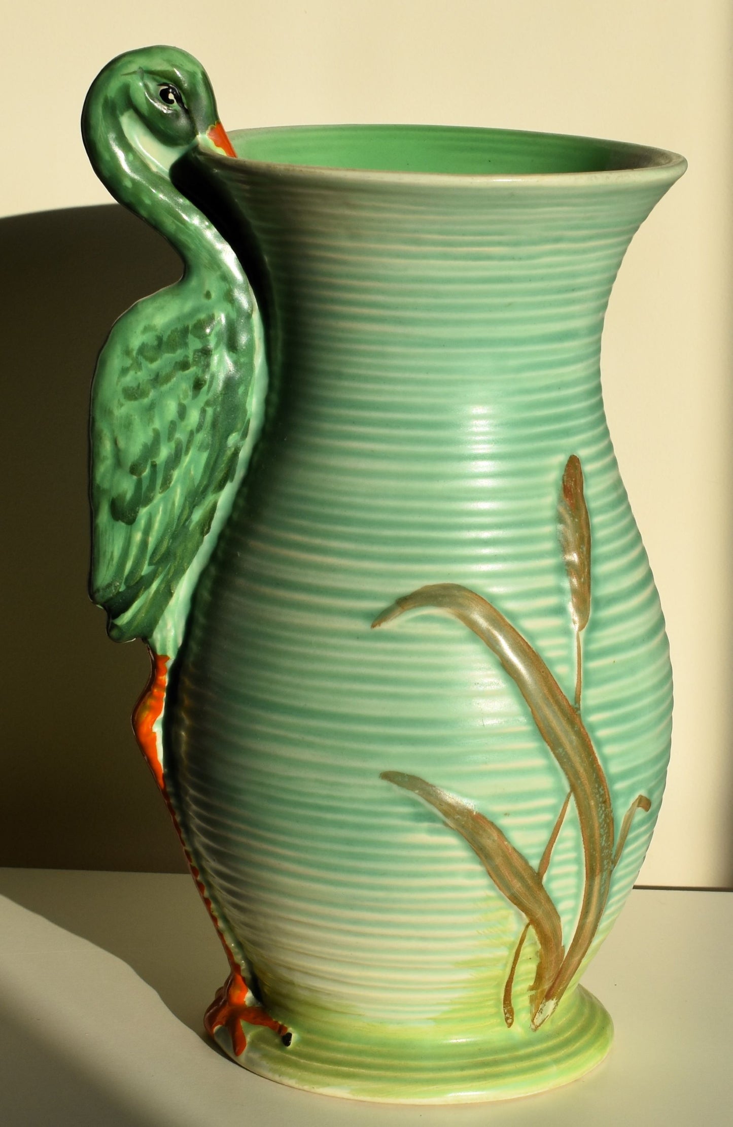 The reverse of the vase is decorated with reeds. The stork is visible as at the front