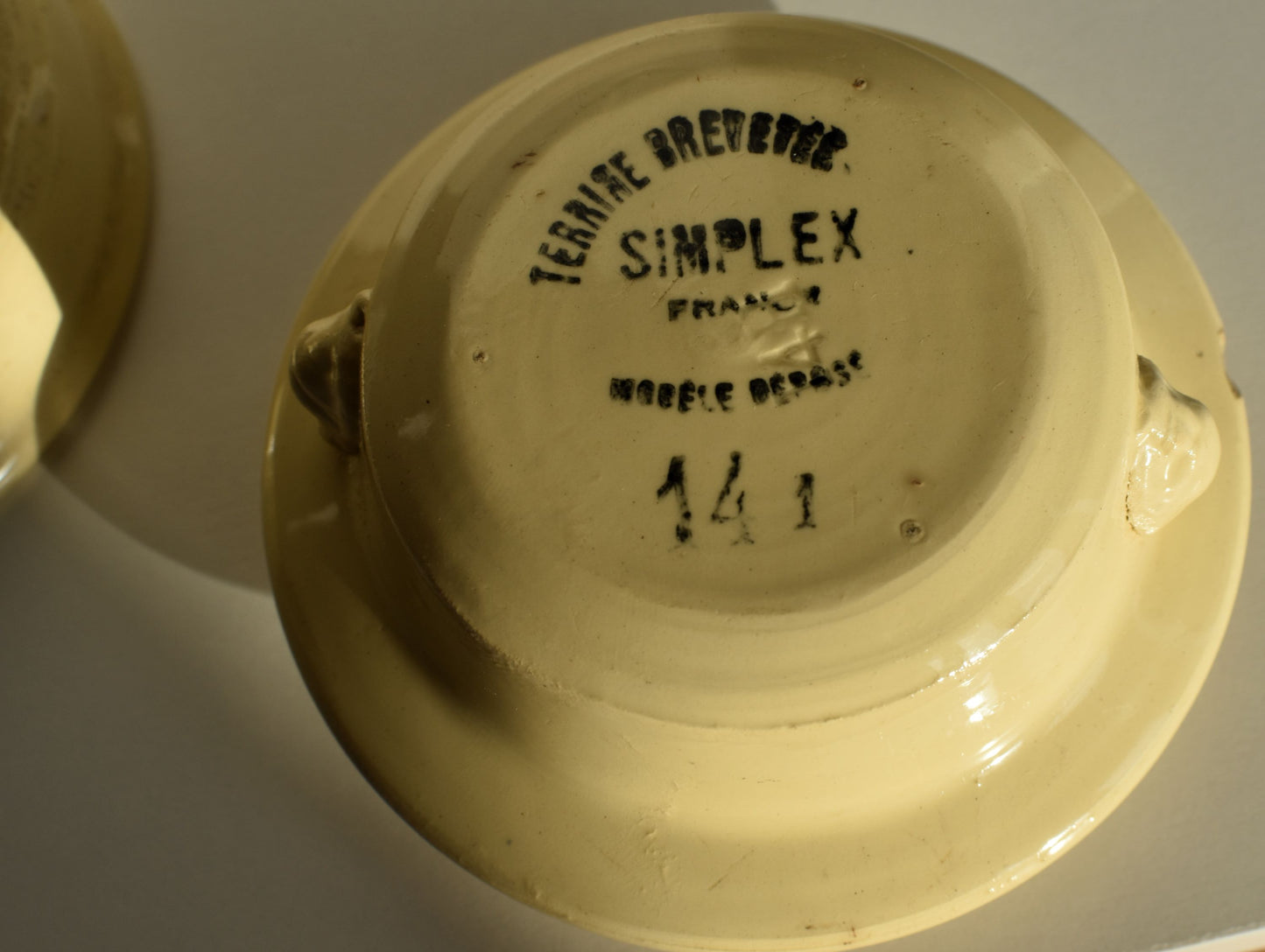 The bottom of the pot reads Simplex, France