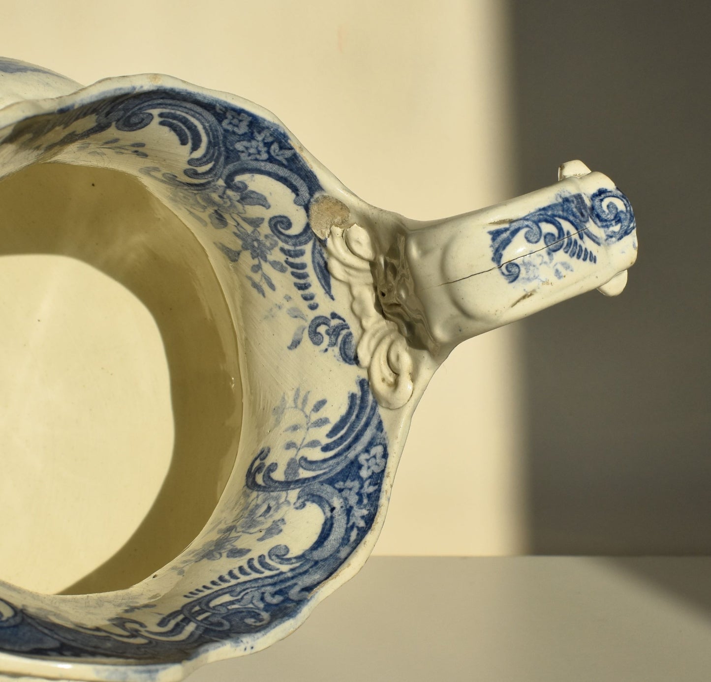There are a few chips in the glaze near the handle