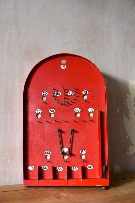 Vintage red bagatelle board