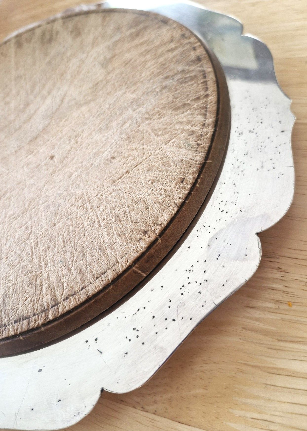 silver plated edge of board showing some small foxing marks