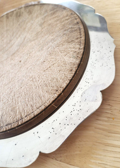 silver plated edge of board showing some small foxing marks