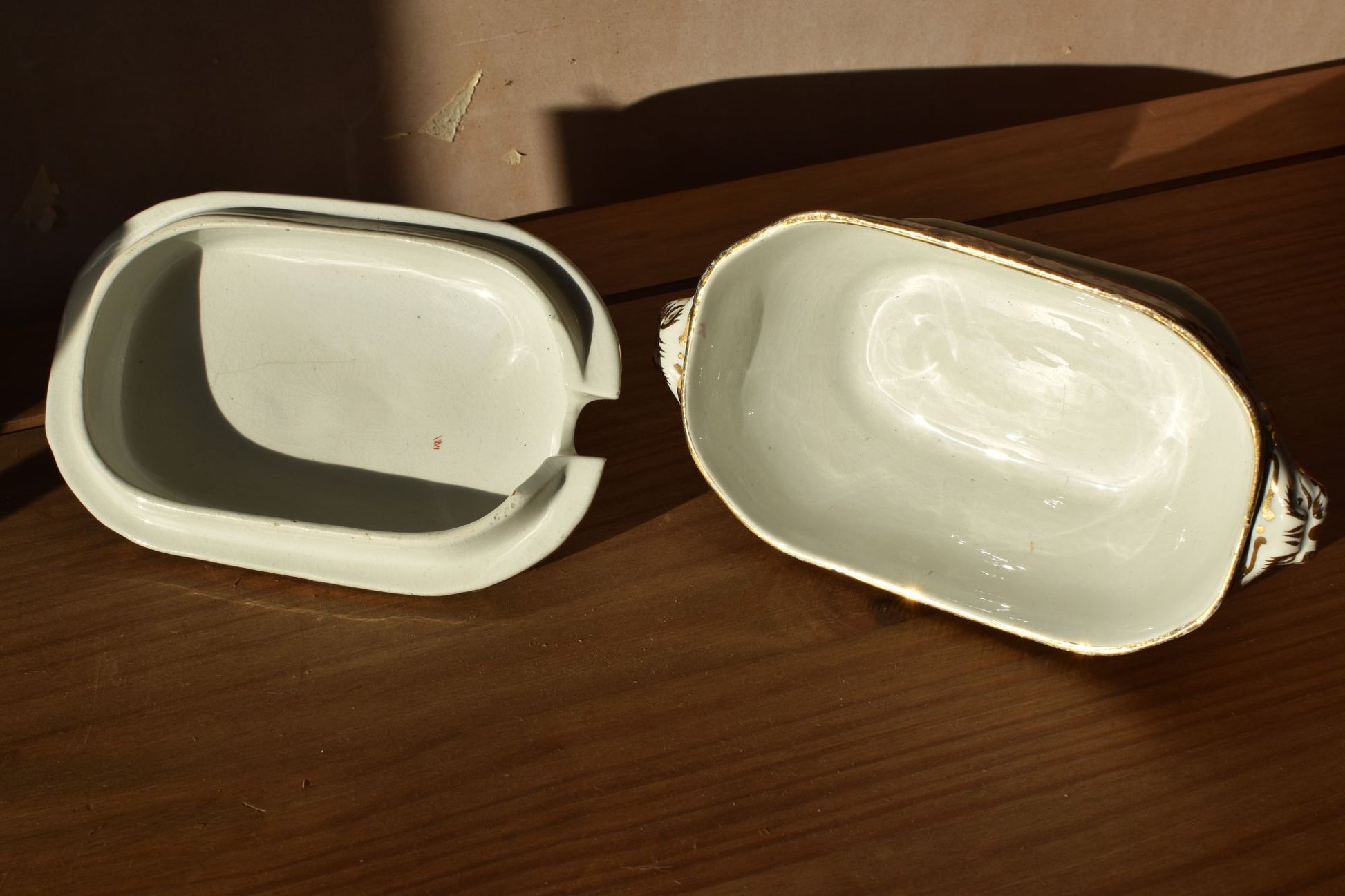 Two ceramic bowls on a wooden surface