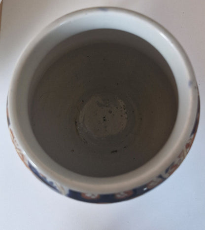 Showing the plain white inside of the vase. No cracks or damage.