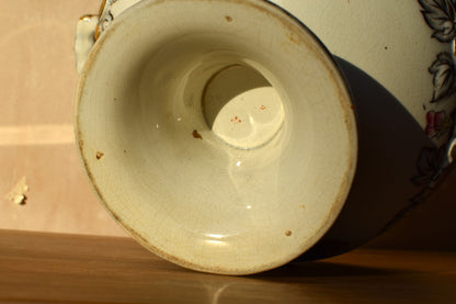 Close-up of a ceramic bowl's base on a wooden surface