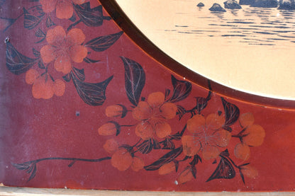 Decorative panel with floral design on a red background